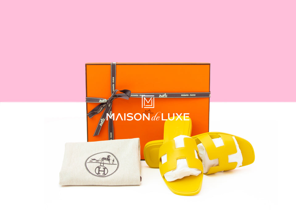 Hermes Women's Jaune Imperial Oran Sandal 37