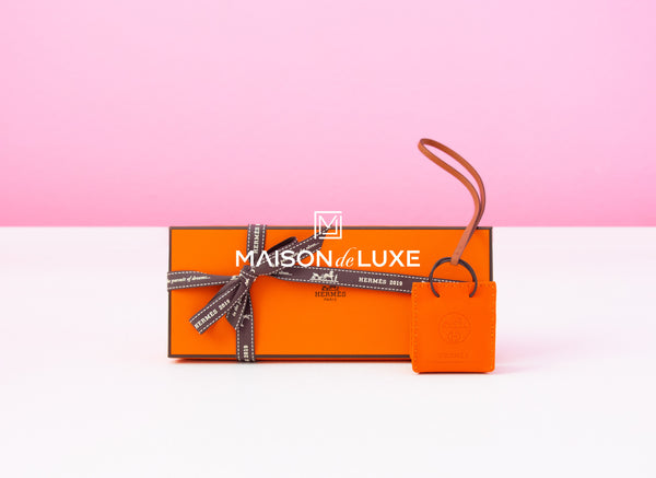 Hermes Orange Mini Shopping Bag Charm – Madison Avenue Couture