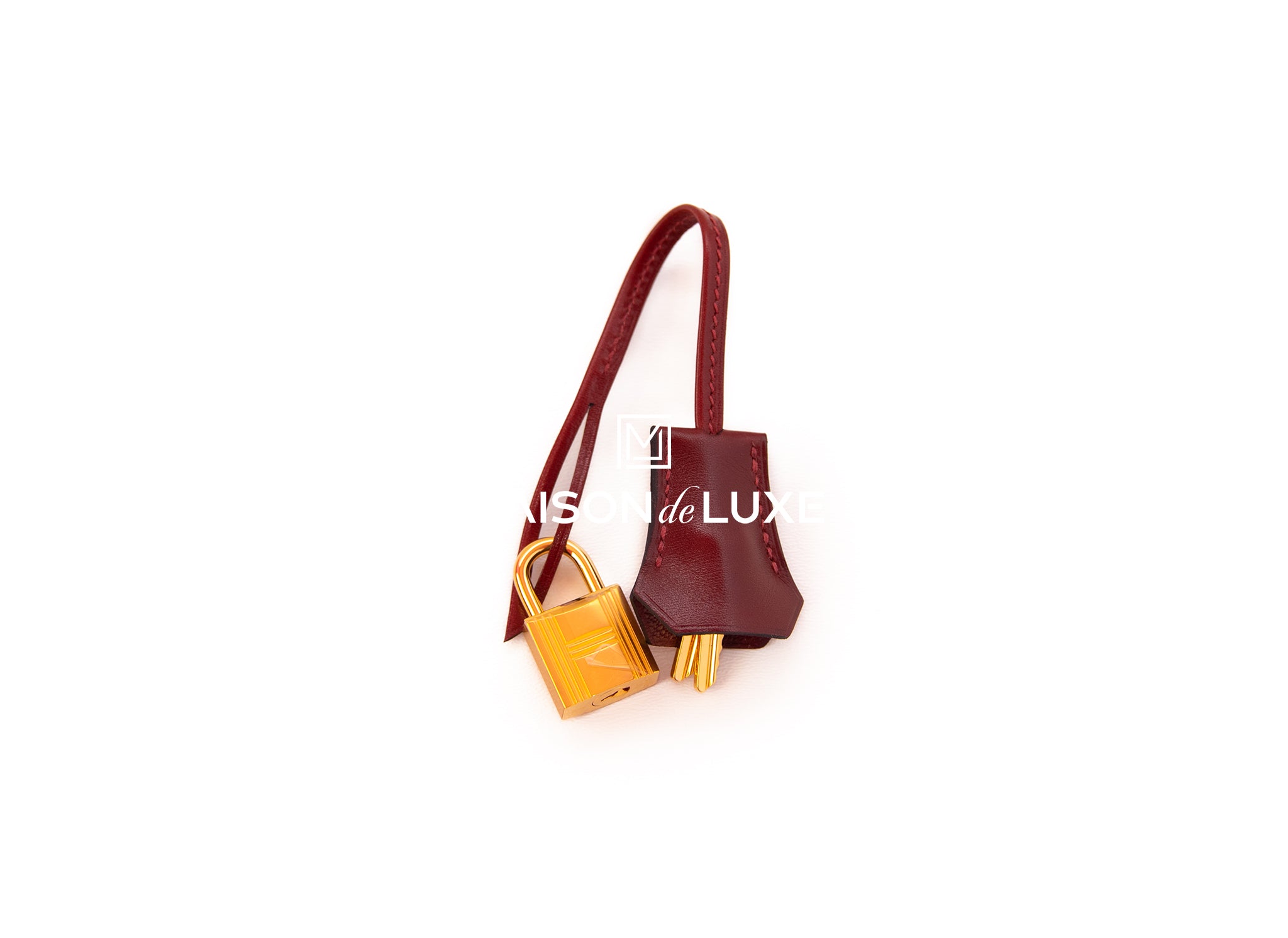 A PERSONALIZED ROUGE H CALF BOX LEATHER HAC BIRKIN 60 WITH GOLD HARDWARE