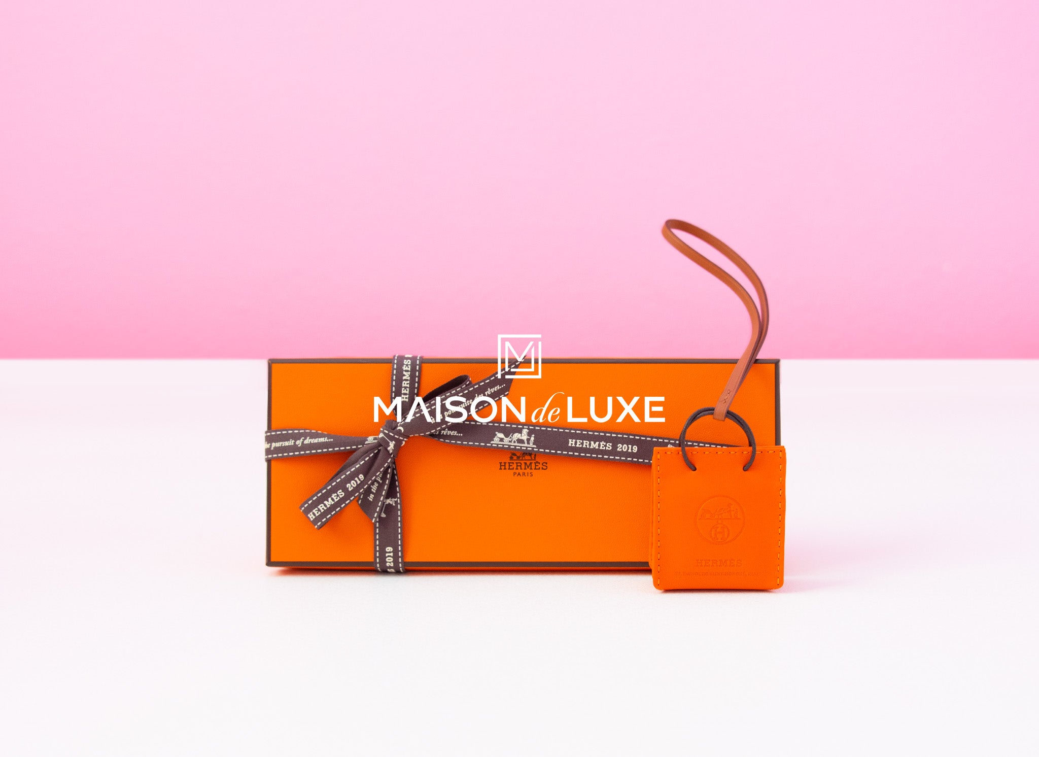 Hermes Orange Mini Shopping Bag Charm – Madison Avenue Couture