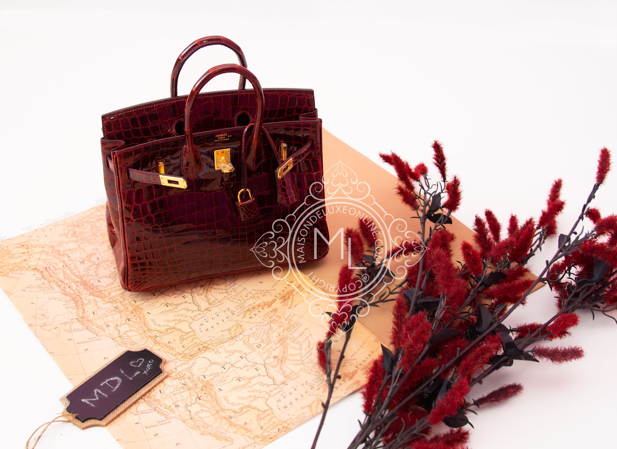 Gorgeous rich burgundy wine colour Birkin bag by Hermes. Stylish