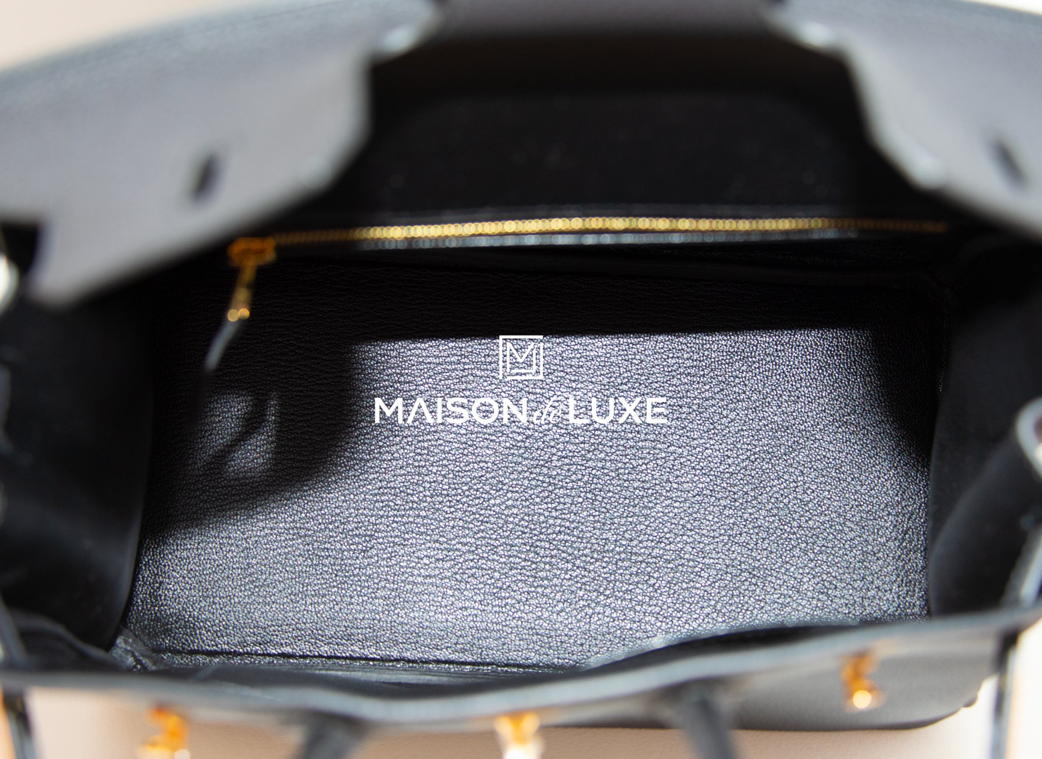 HERMÈS Birkin 25 handbag in Black Togo leather with Gold hardware