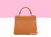 Hermes Kelly Retourne 28 Gold Togo GHW Handbag