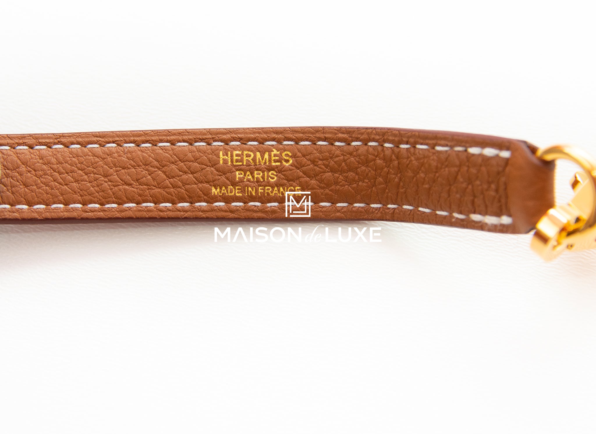 HERMÈS  BLACK RETOURNE KELLY 28CM OF TOGO LEATHER WITH GOLD