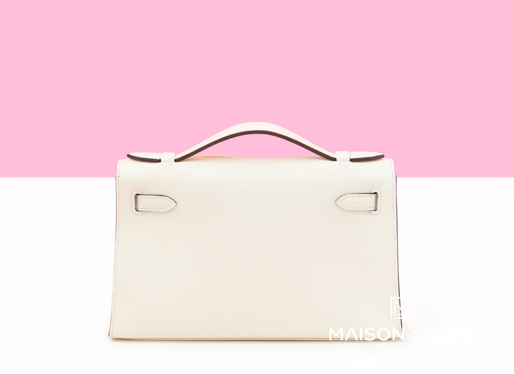 Hermès Kelly pochette online at  ○ Labellov ○ Buy